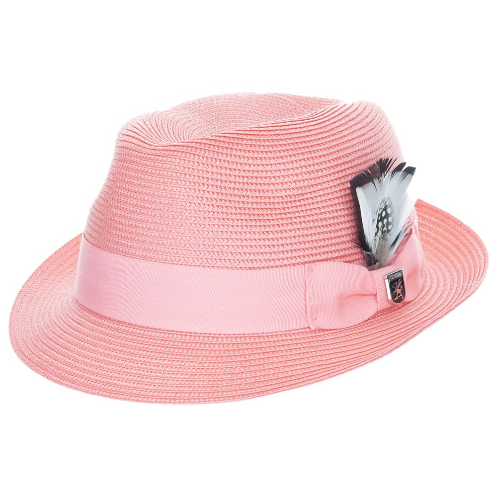 Coral pink colored fedora hat with thick lighter pink band with white and black feather tucked in and a black and silver Stacy Adams pin below it