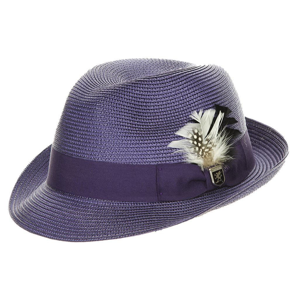Purple colored fedora hat with thick darker purple band with white and black feather tucked in and a black and silver Stacy Adams pin below it