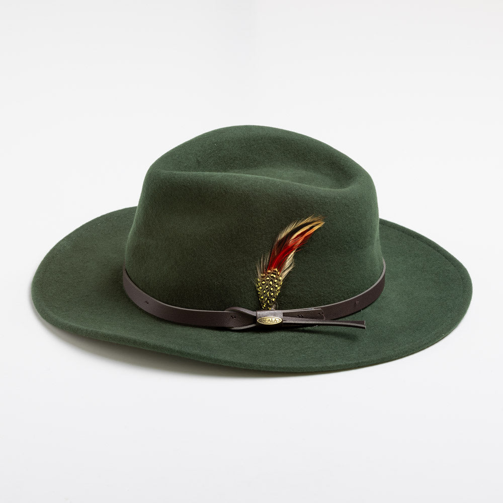Pine colored fedora hat with a feather and brown band on a white background