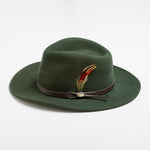 Pine colored fedora hat with a feather and brown band on a white background