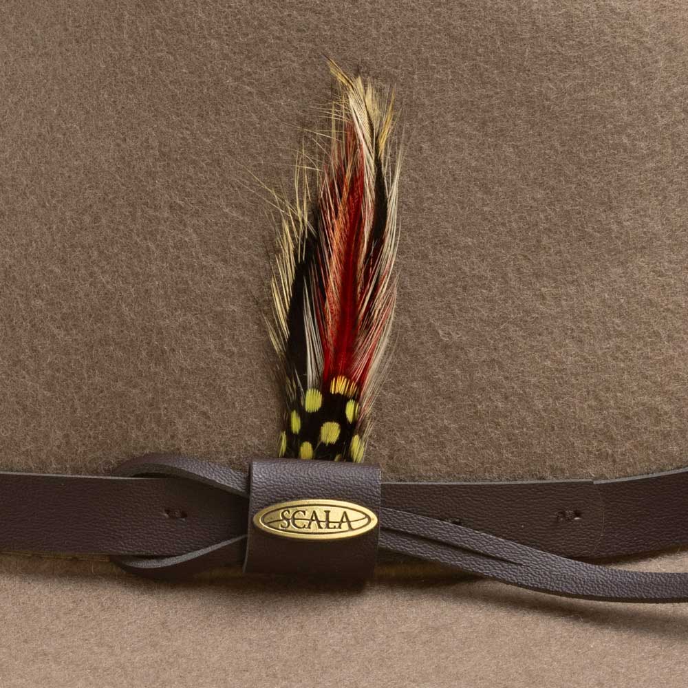 Brown leather band with a decorative feather against a putty colored hat