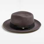 Gray fedora hat with a black band on a white background