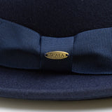 Navy blue bowler hat with a visible Scala brand logo on a white background