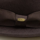 Chocolate brown hat fabric with a bow and Scala logo on a matching background